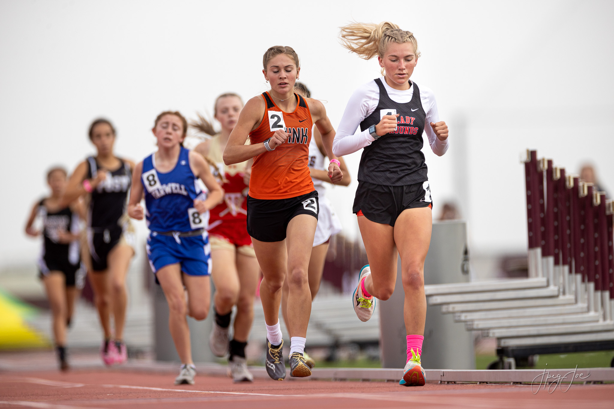 Female runners make their way down the track at the Region 2A-1 Track Meet at WTAMU.