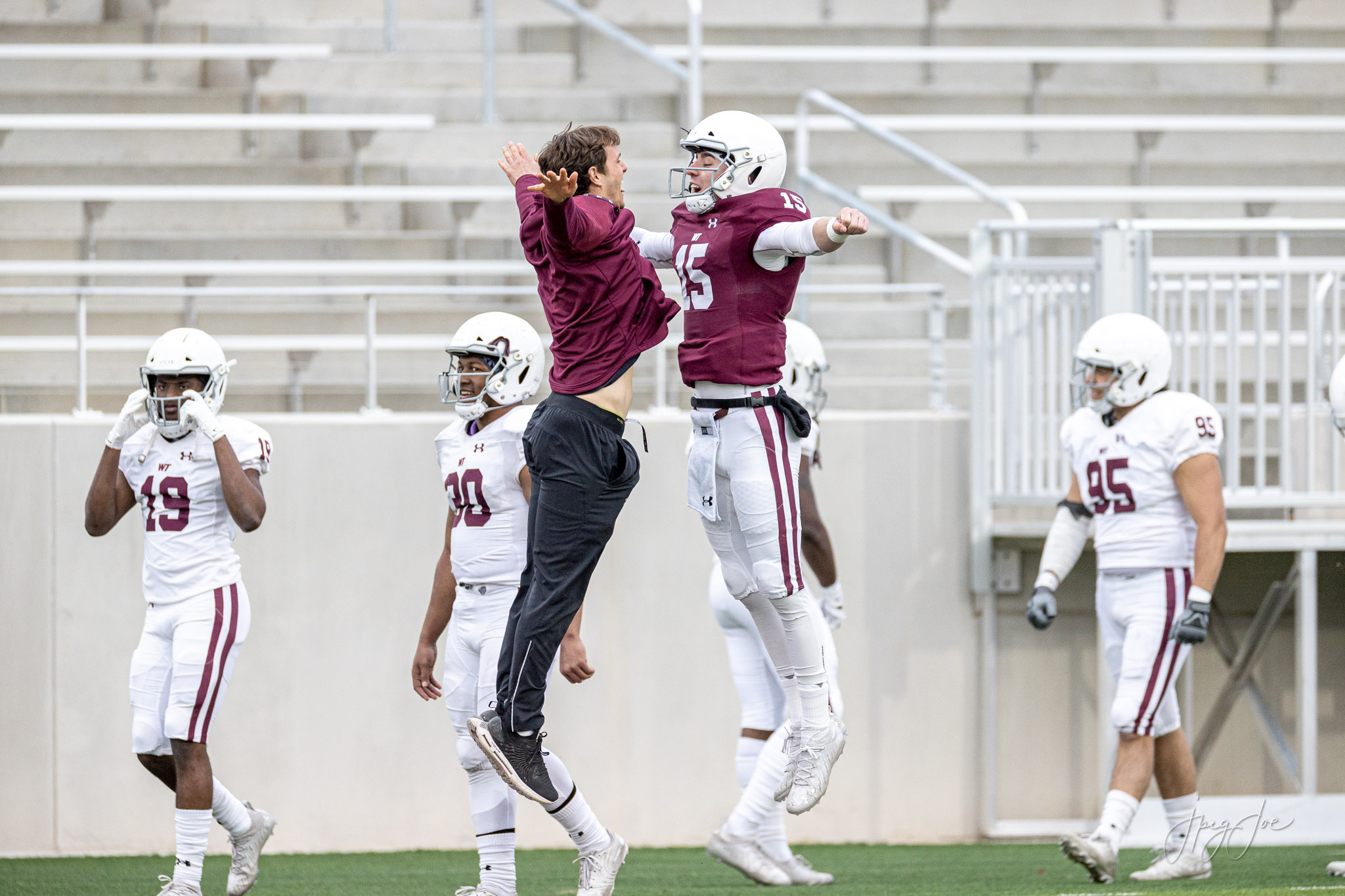 WTAMU player chests bumps one of the support staff at the 2021 Spring Game.